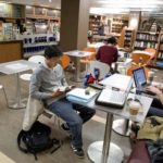 STUDENTS DO HOMEWORK in the new Brown University bookstore last winter. City leaders want to charge private colleges and universities $150 per semester for every out-of-state student they have attending their school. / 