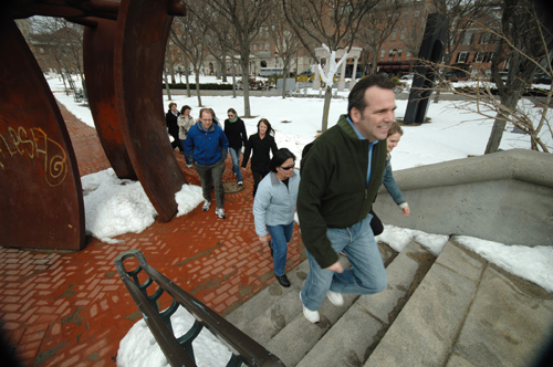 LEO PERONNE leads a group of fellow GTECH Corp. employees participating in Shape Up Rhode Island on a lunchtime walk along the Providence River. / LEO PERONNE leads a group of fellow GTECH Corp. employees participating in Shape Up Rhode Island on a lunchtime walk along the Providence River. /