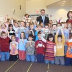JOSEPH BELL, a Bank Newport assistant branch manager, recently visited students at Fort Barton School in Tiverton to teach the ABCs of financial literacy. / 