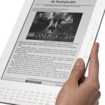 AMAZON.COM WANTS 70 PERCENT of the revenue from newspaper subscriptions sold on its new Kindle DX device, the publisher of the Dallas Morning News told Congress last week. / 