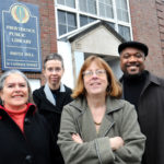 IN CHARGE: Providence Community Library group members, from left, Linda Kushner, Patricia Raub, Karen McAninch and Marcus Mitchell in front of the Smith Hill library branch in Providence. / 