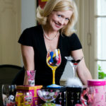 Her party glasses are toasted around the world RECIPE FOR SUCCESS: Lolita Healy, president and CEO of Designs by Lolita, began making martini glasses with recipes on the bottom in 2004. /
