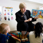 Making a name for herself in day care business THE DOCTOR IS IN: Mary Ann Shallcross Smith, owner of Dr, Day Care’s Child Development Centers, reads to children in her North Smithfield day care. /