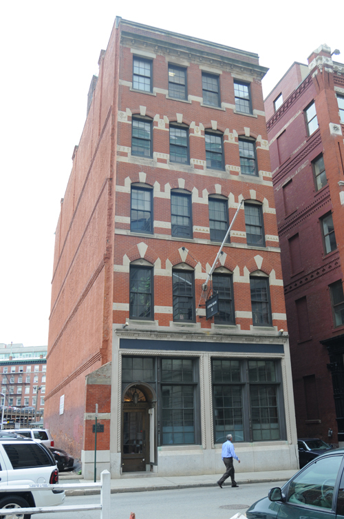 BARE MARKET: Buildings in the Financial District such as 32 Custom House St., above, have been unable to attract buyers. A court-appointed receiver will accept bids for this property and two others in the district. / BARE MARKET: Buildings in the Financial District such as 32 Custom House St., above, have been unable to attract buyers. A court-appointed receiver will accept bids for this property and two others in the district. /