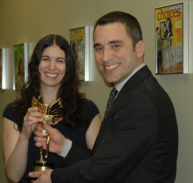Julie O'Connell, editor and sr. copywriter of Choices magazine, and BCBSRI Chief Communications Officer Christopher Medici celebrate one of three 2009 Hermes Creative Awards the publication received Julie O'Connell, editor and sr. copywriter of Choices magazine, and BCBSRI Chief Communications Officer Christopher Medici celebrate one of three 2009 Hermes Creative Awards the publication received