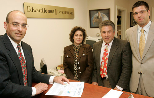SOUND ADVICE: Edward Jones employees, from left, Michael Abood, Deborah Case, Steven Grasso and Anthony Lizzi in the firm’s Cranston office. / SOUND ADVICE: Edward Jones employees, from left, Michael Abood, Deborah Case, Steven Grasso and Anthony Lizzi in the firm’s Cranston office. /