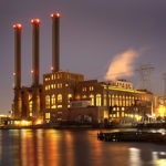 CARBON EMISSIONS FROM POWER PLANTS in Rhode Island and nine other Northeast states were down by 10 percent year-over-year in the first quarter, a new report says. Above, the 450-megawatt Manchester Street power plant in Providence, which burns natural gas. / 