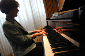 Lois Vaugh on piano / PBN PHOTO/FRANK MULLIN