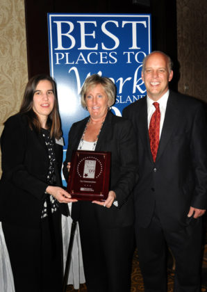 Cox Communications accepts award(fourth year in a row) / PBN PHOTO/FRANK MULLIN