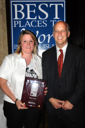 Jeni Wilson, Collette Vacation accepts award from Roger Bergenheim, PBN Publisher  / PBN PHOTO/FRANK MULLIN