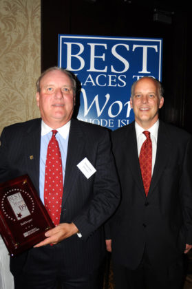 CEO Thomas Kelly accepts award for BankNewport / PBN PHOTO/FRANK MULLIN