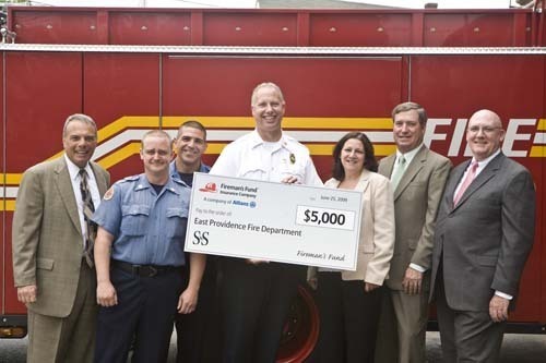 FROM LEFT: Nat Calamis, president and CEO, Starkweather & Shepley; Lt. Mike Carey, East Providence Fire Department; Lt. Julian Bayuk, East Providence Fire Department; Fire Chief Joseph J. Klucznik, East Providence Fire Department; Amy Malanaphy, Fireman’s Fund; William McGillivray, chairman and CFO, Starkweather & Shepley; and Donald Curran, senior vice president, Starkweather & Shepley. / FROM LEFT: Nat Calamis, president and CEO, Starkweather & Shepley; Lt. Mike Carey, East Providence Fire Department; Lt. Julian Bayuk, East Providence Fire Department; Fire Chief Joseph J. Klucznik, East Providence Fire Department; Amy Malanaphy, Fireman’s Fund; William McGillivray, chairman and CFO, Starkweather & Shepley; and Donald Curran, senior vice president, Starkweather & Shepley. /