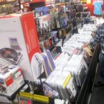FOR THE RECORD: Bob Edwards of Foster peruses the vinyl section at Newbury Comics in Providence Place, eventually settling on a Jimi Hendrix LP. / 