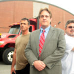 CLEANER AIR: Providence Department of Public Works Director Paul Thomas, center, flanked by DPW Highway Garage Supervisor John Chirichella, right, and DPW Superintendent Sal Solomon. / 