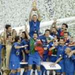 THE ITALIAN TEAM celebrates after defeating France during the 2006 FIFA World Cup final soccer match in Berlin in July 2006. / 