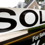 THE MEDIAN PRICE of a single-family home sold in Rhode Island fell 14 percent to $210,000 in the year ending last month, but sales rose 9 percent. / 