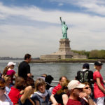 MANY OF THE PROJECTED 39.1 MILLION Labor Day travelers will visit the recently re-opened crown of the Statue of Liberty in New York Harbor. / 
