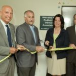 ON HAND for the official opening and "dental floss cutting" were, from left, Dr. Daniel Kane, dental director, Johnston Mayor Joseph Polisena, Lt. Governor Elizabeth H. Roberts and John Fogarty, president and CEO of St. Joseph Health Services of Rhode Island. / 