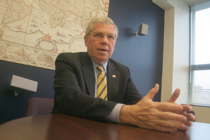 GOV. CARCIERI, shown above in March, is in the final stages of negotiating an agreement with state employee unions to avoid layoffs or a government shutdown. / GOV. CARCIERI, shown above in March, is in the final stages of negotiating an agreement with state employee unions to avoid layoffs or a government shutdown. /