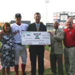 FROM LEFT: Amy Quinn, director of public relations for Cox Communications; Michael Bowden, pitcher  for the Pawtucket Red Sox; Ned Handy, president of Citizens Bank, Rhode Island; Andrew Schiff, chief executive officer of the Rhode Island Community Food Bank; and Lou Schwechheimer, vice president and general manager of the Pawtucket Red Sox. / 