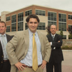 Green initiatives a lure to tenants COLOR OF MONEY: MG Commercial’s Leeds Mitchell IV, left, Michael J. Giuttari and builder Michael Integlia III, center, stand in front of a new building at Metro Center in Warwick which has green features, including UV-reflective glass and efficient HVAC equipment. /