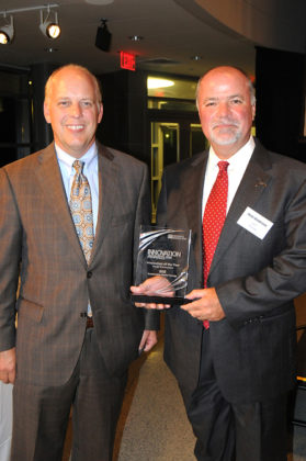 Roger Bergenheim and honoree Blake Henderson, CEO of SGE / PBN PHOTO/FRANK MULLIN