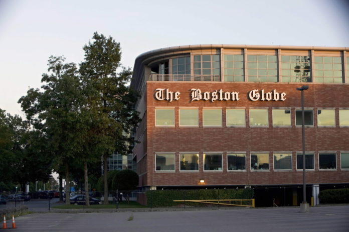THE BOSTON GLOBE and its Web site, Boston.com, will remain part of The New York Times Co., executives said Wednesday after reviewing final bids. / THE BOSTON GLOBE and its Web site, Boston.com, will remain part of The New York Times Co., executives said Wednesday after reviewing final bids. /
