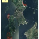 IN THE AIR: A wind feasibility studied adopted by an advisory committee last week explored the potential to place a wind turbine at one of three locations in Jamestown, outlined above in red. / 