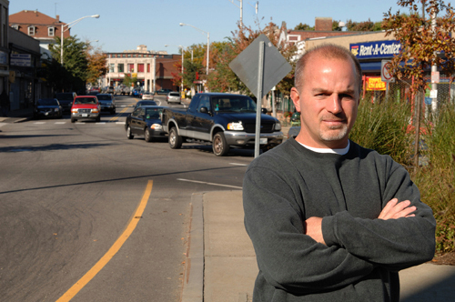 SELLING THE AREA: Gregory P. Stevens, owner and operator of the Olneyville New York System on Plainfield Street in Providence, worked with the city’s Neighborhood Markets Program to resurrect the long-dormant Olneyville Merchants Association. / SELLING THE AREA: Gregory P. Stevens, owner and operator of the Olneyville New York System on Plainfield Street in Providence, worked with the city’s Neighborhood Markets Program to resurrect the long-dormant Olneyville Merchants Association. /