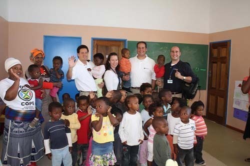 BEFORE THE TRIP: Collette Vacations’ employees put together physical education packs and greetings to children at Tenderfeet Education Center. Pictured are Lisa Corrente, far left, and Bill Dziura, second from right. / BEFORE THE TRIP: Collette Vacations’ employees put together physical education packs and greetings to children at Tenderfeet Education Center. Pictured are Lisa Corrente, far left, and Bill Dziura, second from right. /