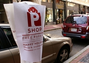 SPECIAL COVERINGS, shown above, have been placed on parking meters in parts of the city to designate where drivers can park for free during the holidays. / SPECIAL COVERINGS, shown above, have been placed on parking meters in parts of the city to designate where drivers can park for free during the holidays. /
