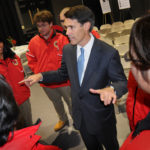 BANKING ON SUCCESS: William F. Hatfield, president of Bank of America Rhode Island, speaks with members of the youth program City Year, at the Met School in Providence. / 