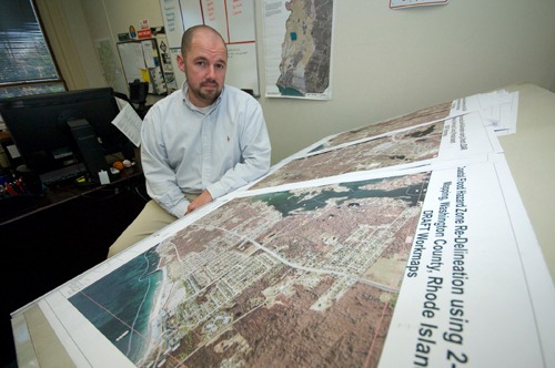 LAY OF THE LAND: Narragansett Environmental Planning Specialist Jay Parker says that roughly 4,000 properties in the town are within 500 feet of the floodplain border. Nearly 200 buildings could be added to the floodplain because of redefined maps. / LAY OF THE LAND: Narragansett Environmental Planning Specialist Jay Parker says that roughly 4,000 properties in the town are within 500 feet of the floodplain border. Nearly 200 buildings could be added to the floodplain because of redefined maps. /