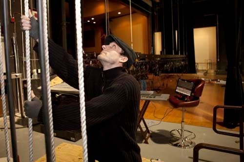 A GRAND STAGE: Mike Carcieri, a sound and lighting engineer at the RICPA Historic Park Theatre in Cranston, raises a section of lighting at the recently reopened theater. / A GRAND STAGE: Mike Carcieri, a sound and lighting engineer at the RICPA Historic Park Theatre in Cranston, raises a section of lighting at the recently reopened theater. /