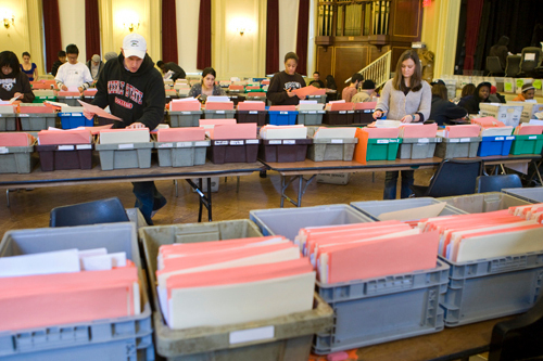 APPLIED EDUCATION: Temporary workers in Brown University’s Alumnae Hall process some of the 30,000 applications the university received for its incoming class last month. The school said that figure represented a record. / APPLIED EDUCATION: Temporary workers in Brown University’s Alumnae Hall process some of the 30,000 applications the university received for its incoming class last month. The school said that figure represented a record. /