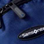 THE SAMSONITE LOGO is displayed on a backpack. The company moved its headquarters to Mansfield in 2006 after 97 years in Denver. / 