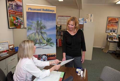 JUDY CLAPPIN, right, owner of Donovan Travel, and agent Stacy Rappoport. Clappin recently pushed for the state to give preference to R.I. small businesses for contracts. / JUDY CLAPPIN, right, owner of Donovan Travel, and agent Stacy Rappoport. Clappin recently pushed for the state to give preference to R.I. small businesses for contracts. /