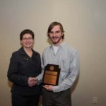 ERIN MOSELY, President of NEWEA, presents Michael Hodde with the NEWEA 2009 Rhode Island Operator of the Year award. / 