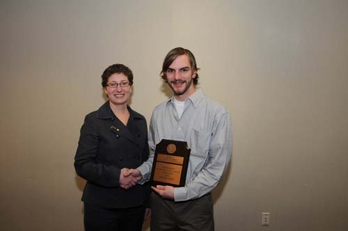 ERIN MOSELY, President of NEWEA, presents Michael Hodde with the NEWEA 2009 Rhode Island Operator of the Year award. / ERIN MOSELY, President of NEWEA, presents Michael Hodde with the NEWEA 2009 Rhode Island Operator of the Year award. /