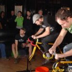 Nonprofit startups forging ahead AS PART OF a series of indoor races held at McFadden’s in Providence to benefit the U.S. Open Cycling Foundation, competitors race for 500 meters. /