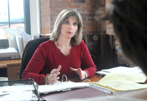 TAXING WORK: Jacquelyn H. Tracy, partner at Mandel & Tracy in Providence, is advising people to get their taxes done quickly despite the deadline reprieve. / TAXING WORK: Jacquelyn H. Tracy, partner at Mandel & Tracy in Providence, is advising people to get their taxes done quickly despite the deadline reprieve. /