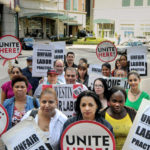 STANDING TALL: Union workers at The Westin Providence Hotel are urging a boycott of the hotel due to deep wage cuts. / 