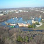 New respect for sewage treatment after flood UNDER SIEGE: Warwick’s only wastewater-treatment plant appears to be floating a week after late March storms left much of the facility underwater. / COURTESY R.I. AIRPORT CORP.