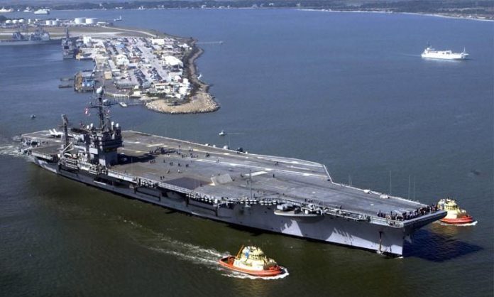 THE USS JOHN F. KENNEDY, shown departing Naval Station Mayport in Florida in 2003, was christened in 1968 and decommissioned in 2007. / THE USS JOHN F. KENNEDY, shown departing Naval Station Mayport in Florida in 2003, was christened in 1968 and decommissioned in 2007. /