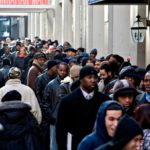 U.S. gains 290,000 jobs; jobless rate rises JOB SEEKERS wait to enter a job fair in New York City last winter. The U.S. economy has added jobs every month so far this year, the government said Friday. /