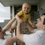 CREDIT DUE: Anastasia and Ben Wachter, with son Matthew. The couple recently took advantage of the homebuyers tax credit. / 