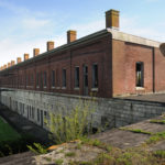Jack McCormack, site manager at the Fort Adams Land Trust, stands near the 19th-century Newport fort’s southern wall, the only section with a second story. In November, the trust launched a $250,000 study to find ways to regularly open the fort to the public for the first time. If all goes well, the parade field could open as early as 2012. / 
