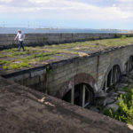 A FORT&rsquo;S WORTH: Jack McCormack, site manager at the Fort Adams Trust, walks along the roof over the western wall of Fort Adams. The trust is examining potentially expanding public use of the site. / 