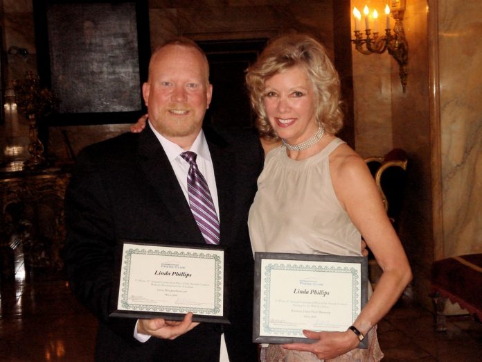 NEWPORT SEEN's creators and social reviewers, award-winning graphics designer and branding expert Tom Roskelly, left, and reviewer/photojournalist Linda Phillips, display their prizes after the Connecticut Press Club awards ceremony. / 