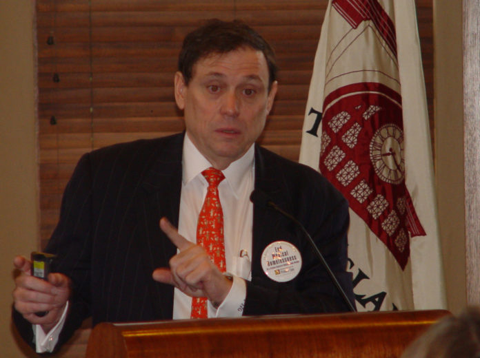 DR. PAUL GRUNDY, president of IBM's Patient-Centered Primary Care Collaborative, speaks about health care reform to a group of physicians and businesspeople at the Rhode Island Foundation in Providence on Thursday. / DR. PAUL GRUNDY, president of IBM's Patient-Centered Primary Care Collaborative, speaks about health care reform to a group of physicians and businesspeople at the Rhode Island Foundation in Providence on Thursday. /